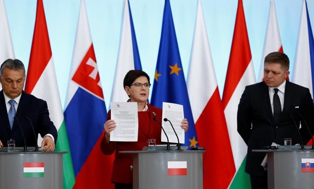 Visegrad Group (V4) member nations' Prime Ministers, Hungary's Viktor Orban, Poland's Beata Szydlo and Slovakia's Robert Fico, attend a news conference during a summit in Warsaw, Poland March 2, 2017 – Reuters