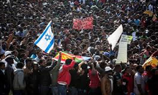 African migrants take part in a protest at Rabin Square in Tel Aviv, Israel January 5, 2014. REUTERS/Nir Elias/File Photo