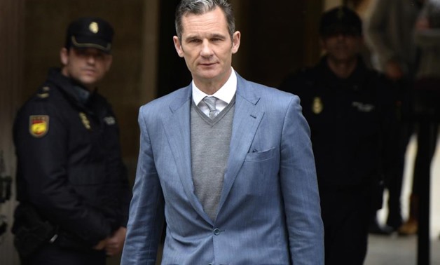 FILE - In this file photo dated Thursday, Feb. 23, 2017, Inaki Urdangarin, husband to Spain's Princess Cristina, as he leaves a courthouse in Palma de Mallorca, Spain. Urdangarin was sentenced earlier 2017 to six years and three months in prison for fraud