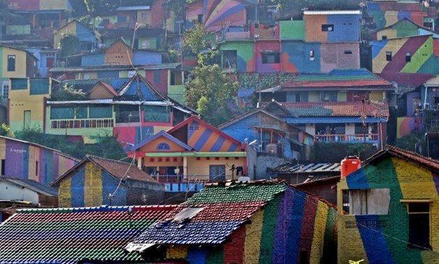 A view of colourful houses at the Kampung Pelangi village in Semarang, Indonesia, May 14, 2017 in this photo taken by Antara Foto. Picture taken May 14, 2017. Antara Foto/Aditya Pradana Putra via REUTERS