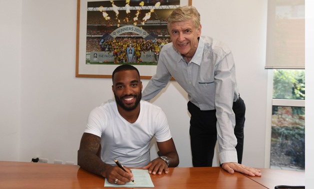 Alexander Lacazette with Arsene Wenger (Arsenal coach) - Press image courtesy Arsenal's official twitter account