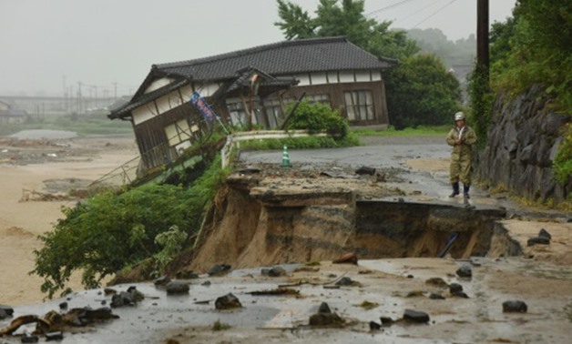 Huge floods engulfing parts of Kyushu have left hundreds stranded.  Photo: AFP
