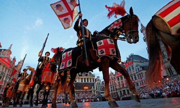 Performers in historic costumes take part in a procession during the annual medieval festival, the Ommegang, at Brussels' Grand Place, Belgium July 7, 2017. REUTERS/Yves Herman