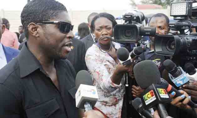This file photo taken on December 23, 2014 shows Teodorin Obiang Nguema, the son of Equatorial Guinea's president Teodoro Obiang Nguema, talking to journalists in Malabo, during a distribution of gifts to disadvantaged children. In 2012, French authoritie