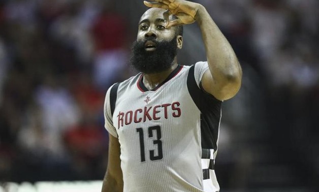 Houston Rockets guard James Harden celebrates after making a three point basket during the third quarter against the San Antonio Spurs in game four of the second round of the 2017 NBA Playoffs at Toyota Center / REUTERS 
