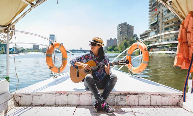 Souad Massi’s Play the guitar at the Nile – Courtesy of Souad Massi official Facebook Account


