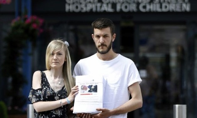 © AFP/File | Gard's parents submitted a petition of over 350,000 signatures demanding that they be allowed to take him to the United States for treatment
