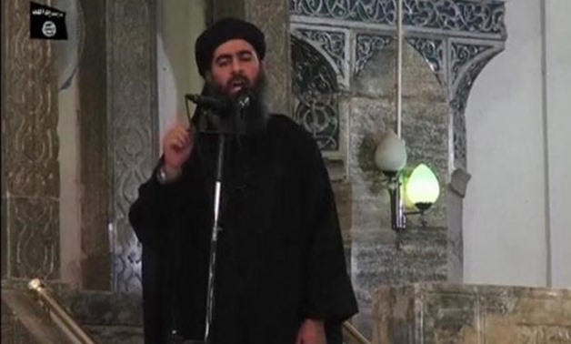 Abu Bakr al-Baghdadi at a mosque in the centre of Iraq's second city - REUTERS/Social Media Website via Reuters TV