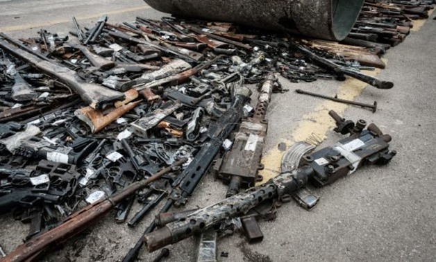 Brazilian Army personnel destroys some 4000 firearms collected by the Federal Police in the state of Rio de Janeiro in the past two years on June 2, 2017. Violence between rival drug gangs in Rio is becoming more bloody that the International Committee of