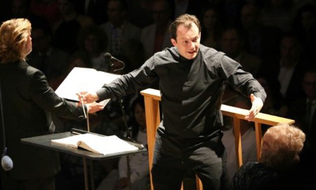 © AFP/FileAndris Nelsons (R), pictured in August 2015, is the third high-profile departure from the New York Metropolitan Opera's upcoming production of "Tosca"