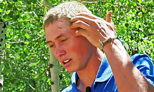 This still frame from video provided by KMGH-TV shows a teen staffer at a Colorado camp, who gave only his first name, Dylan, describing how he fought off a bear after waking up to find the animal biting his head and trying to drag him away at the camp ne