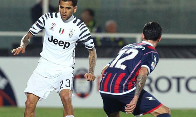  Juventus' Brazilian defender Dani Alves (left) fights for the ball with Crotone's Romanian midfielder Adrian Stoian (right) during their Italian Serie A match on February 8, 2017 at the Ezio Scida Stadium, in Crotone. PHOTO | CARLO HERMANN