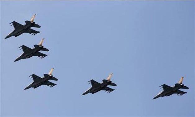 Israeli Air Force F-16 war planes fly in formation over the Mediterranean Sea as part of celebrations for Israel's Independence Day- Reuters