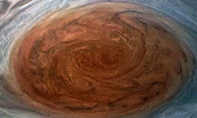 This NASA handout image obtained July 12, 2017 shows the Great Red Spot on Jupiter taken by the Juno Spacecraft on its flyby over the storm on July 11. // AFP PHOTO / NASA /
