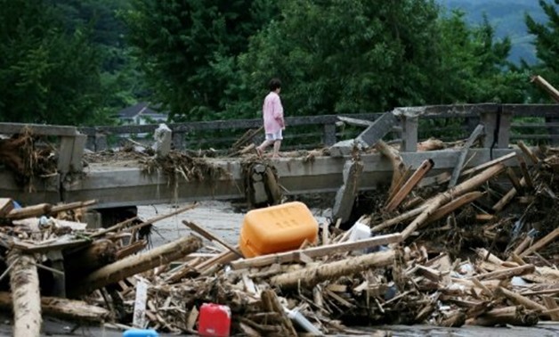 © JIJI PRESS/AFP/File | Kyushu has been left devastated after overflowing rivers and torrential downpours swept away roads, houses and schools

