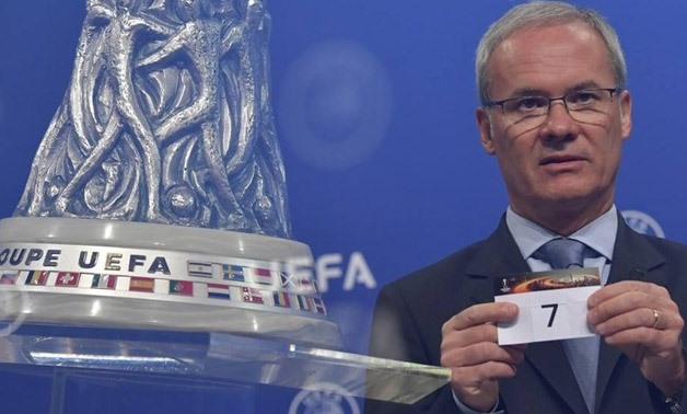 UEFA Deputy General Secretary Giorgio Marchetti makes the draw