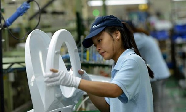 China's growth slipped to a new seven-year low of 6.6 percent in the second quarter, according to an AFP survey AFP/STR
