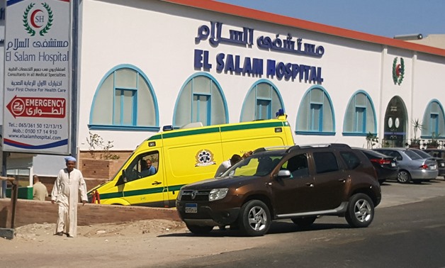 A man walks in front of an ambulance arriving at El Salam Hospital after an Egyptian man stabbed two German tourists to death and wounded four others at the beach of the Zahabia hotel, in Hurghada, south of the capital Cairo, Egypt, July 14, 2017. REUTERS