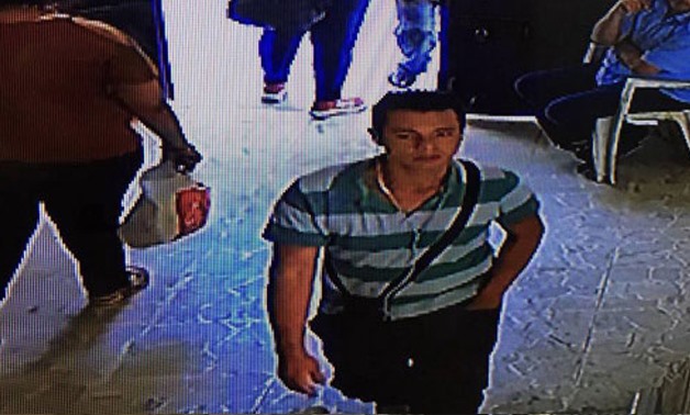 Photos of the assailant as shown at surveillance cameras - Press photo