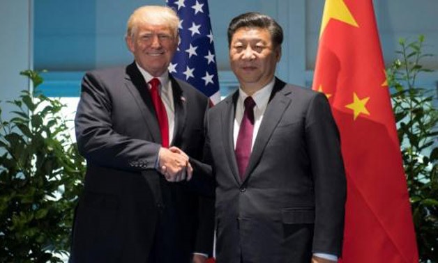 US President Donald Trump hosted a lavish welcome for his Chinese counterpart Xi Jinping - AFP