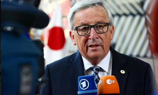 President of the European Commission Jean-Claude Juncker speaks to the press at the European Council - AFP