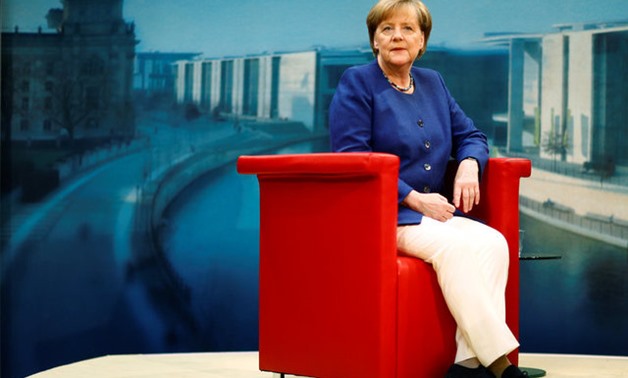 German Chancellor Merkel arrives for a TV interview by ARD public broadcaster in Berlin - Reuters