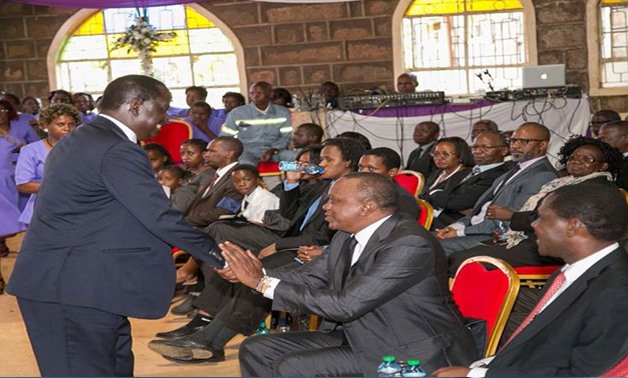 Odinga greets Uhuru Kenyatta at a recent event. The two giants are set to battle again in the presidential election