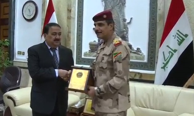 General Yarallah is awarded by the Iraqi Defense Minister following Liberation of Mosul- Press photo