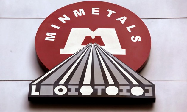 The company logo of Minmetals Resources is displayed outside its headquarters in Hong Kong April 26, 2011.
