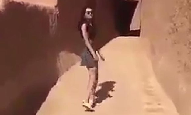 Authorities in Saudi Arabia are investigating a young woman who posted a video of herself wearing a miniskirt and crop-top in public.