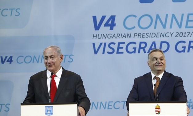 Israel's Prime Minister Netanyahu attends a news conference with the Visegrad Group states Prime Ministers in Budapest - Reuters