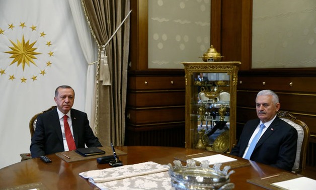 Turkish President Tayyip Erdogan meets with Prime Minister Binali Yildirim in Ankara, Turkey July 19, 2017. Kayhan Ozer/Presidential Palace/Handout via REUTERS 