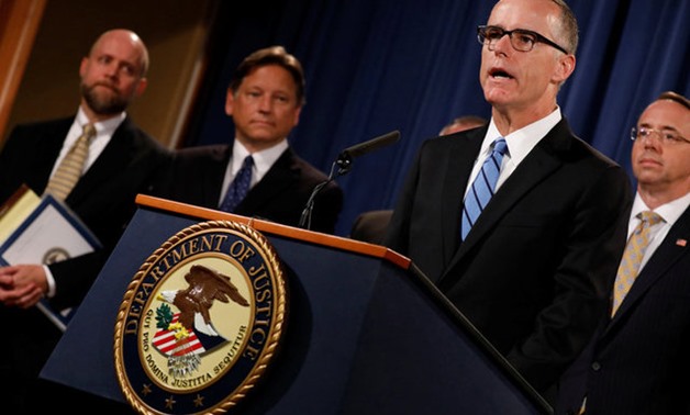 FBI Acting Director Andrew McCabe speaks during a news conference announcing the takedown of the dark web marketplace AlphaBay, at the Justice Department in Washington - Reuters