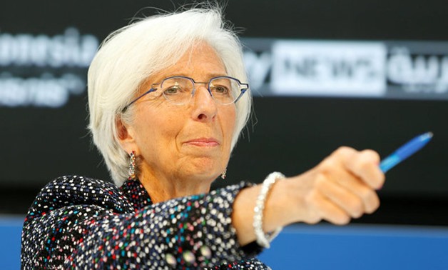 FILE - IMF Managing Director Lagarde moderates a forum