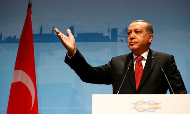 Turkish President Recep Tayyip Erdogan gestures during a news conference to present the outcome of the G20 leaders summit in Hamburg, Germany July 8, 2017. REUTERS