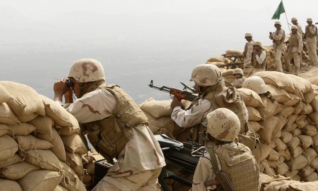  Saudi soldiers keep watch at Khoba, the frontline border with Yemen- File photo- Reuters