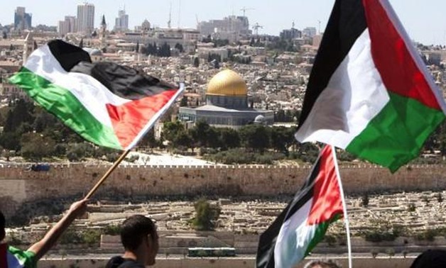 Palestinian Flag at Al-Quds - File photo