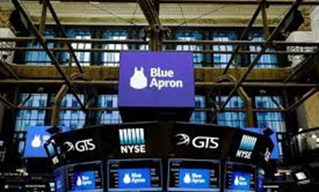 The logo of Blue Apron is shown on screens above the floor of the New York Stock Exchange before the company's IPO in New York, U.S., June 29, 2017.

