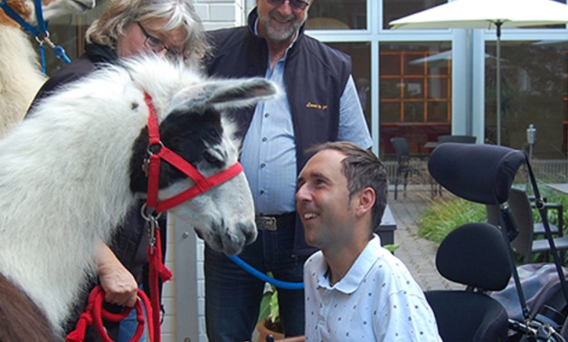  Martyn-face-to-face-with-a-Llama-via disability horizons