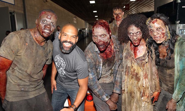 SAN DIEGO, CA – JULY 21: Actor Khary Payton (2nd L) from “The Walking Dead” poses with zombies at San Diego Comic-Con International 2017 at the San Diego Convention Center on July 21, 2017 in San Diego, California. Jesse Grant/Getty Images for AMC/AFP. Je