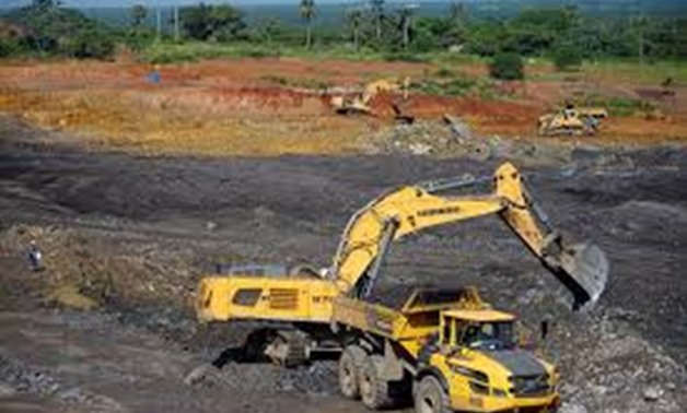 An excavator loads a truck at an area being prepared to be used by the lead and zinc mine Castellanos in Minas de Matahambre, Cuba, July 20, 2017.

