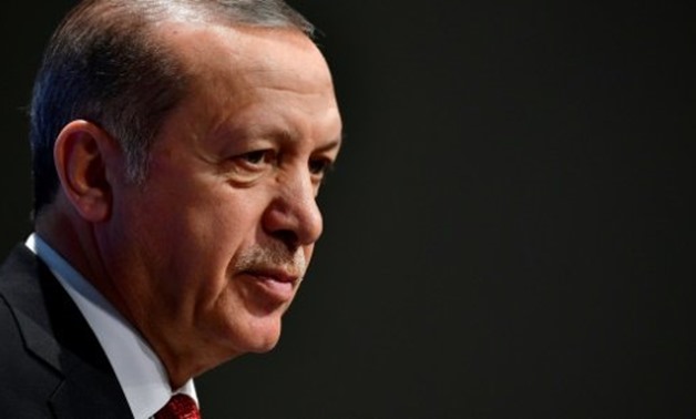 © AFP/File | Turkish President Recep Tayyip Erdogan launched a new broadside against Germany on Sunday
