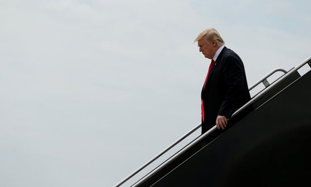 U.S. President Donald Trump arrives aboard Air Force One at Washington's Dulles International Airport in Chantilly, Virginia, U.S. July 22, 2017. REUTERS/Jonathan Ernst

