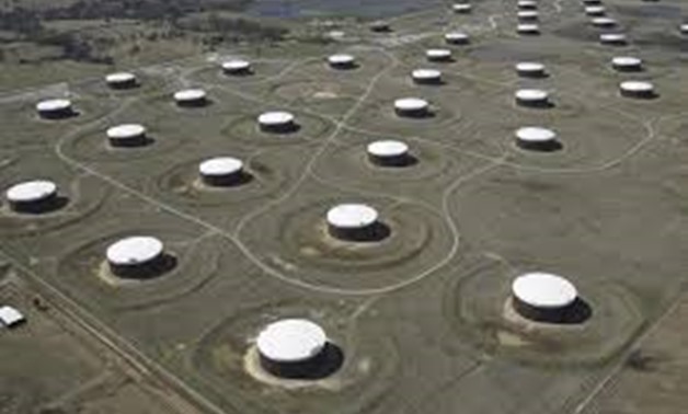 Crude oil storage tanks are seen from above at the Cushing oil hub, in Cushing, Oklahoma, March 24, 2016.
