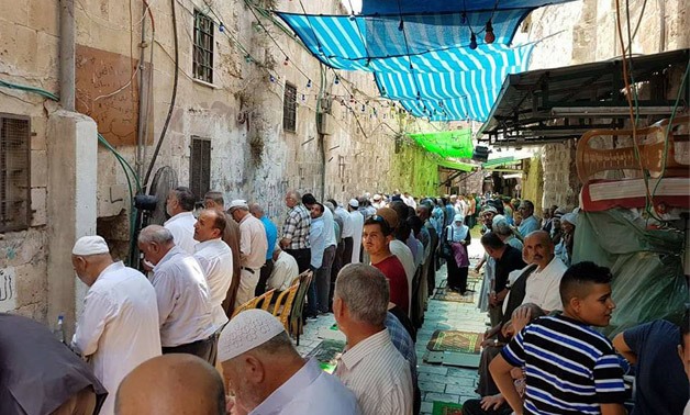 Palestinians pray in the streets of Jerusalem - Photo courtesy of the Palestinian Ministry of Awqaf facebook page