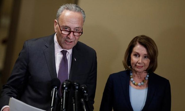 Senate Minority Leader Chuck Schumer and House Minority Leader Nancy Pelosi speak at a news conference about the Congressional Budget Office's report on the American Health Care Act at the Capitol in Washington, D.C. - Reuters