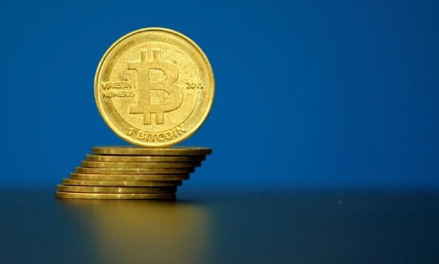 Bitcoin (virtual currency) coins are seen in an illustration picture taken at La Maison du Bitcoin - Reuters