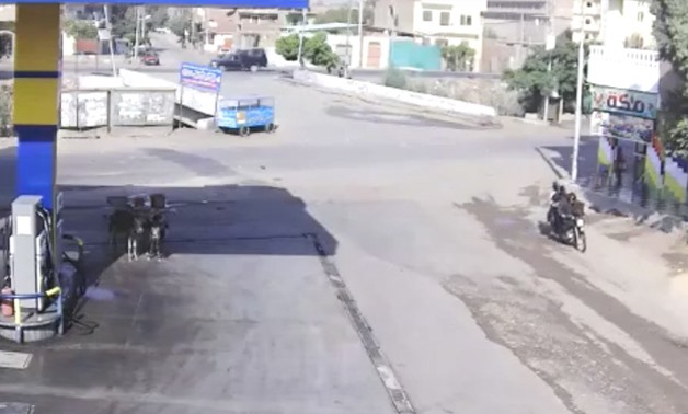 A shot of the video tracking moment when the perpetrators fled from the scene after committing the attack of al-Badrasheen
