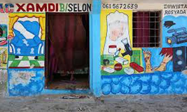 A mural on a shop front illustrates electrical appliances in Wabari district of Mogadishu, Somalia, June 8, 2017.
Feisal Omar