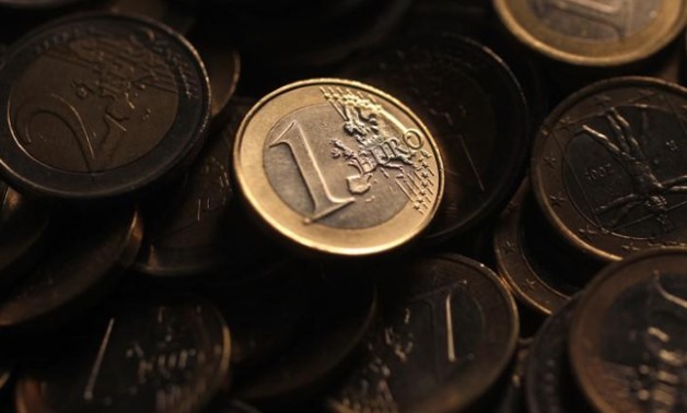 Euro coins are seen in this photo illustration taken in Rome, December 9, 2011.